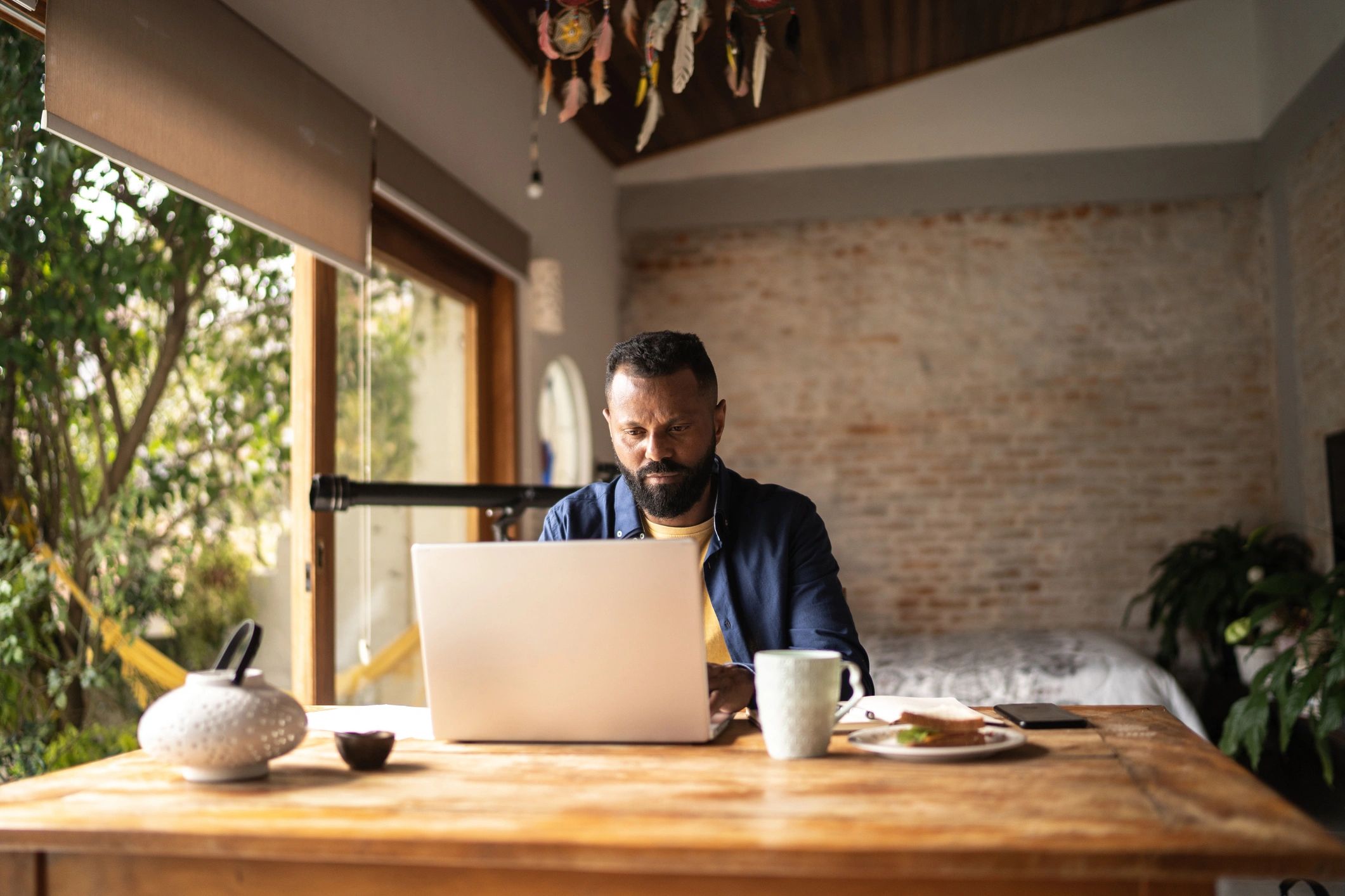 Investor reviewing market notes on a laptop